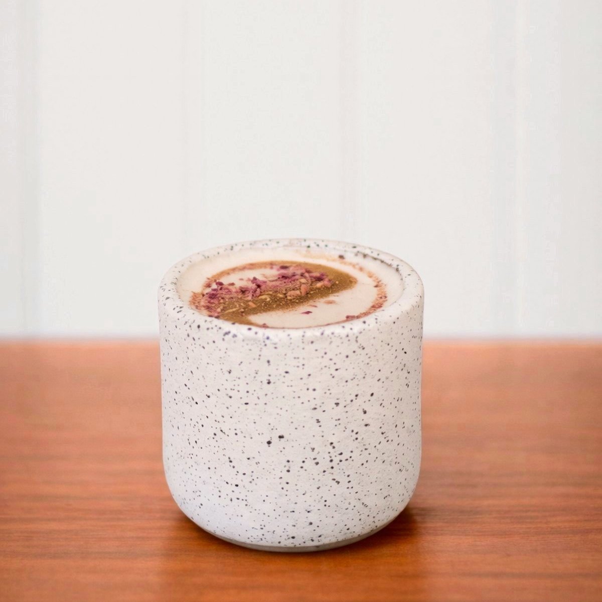 Sticky chai in a speckled cup