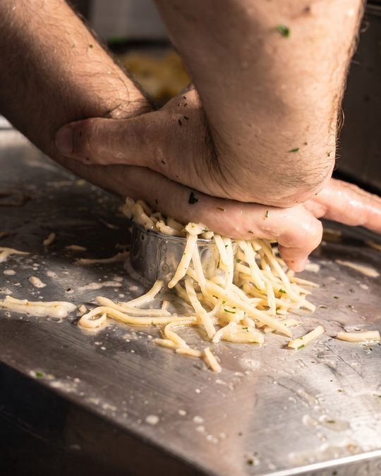Pressing a rosti by hand