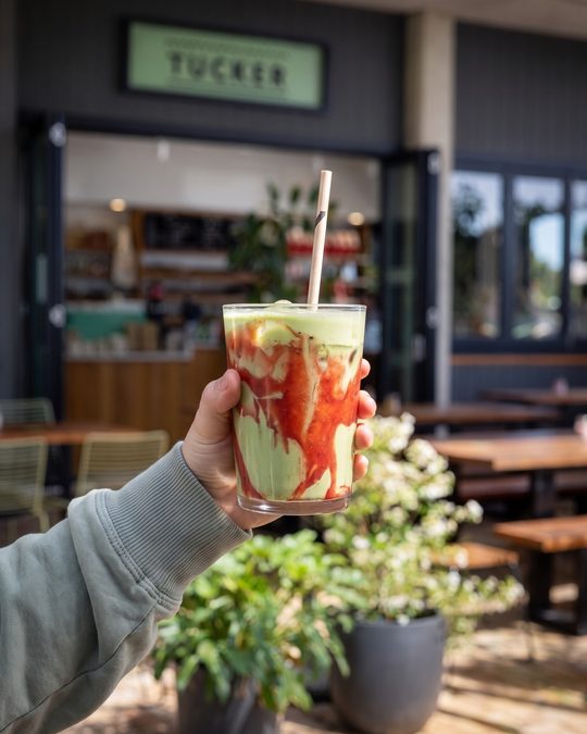 Smoothie held up outside the Tucker shopfront